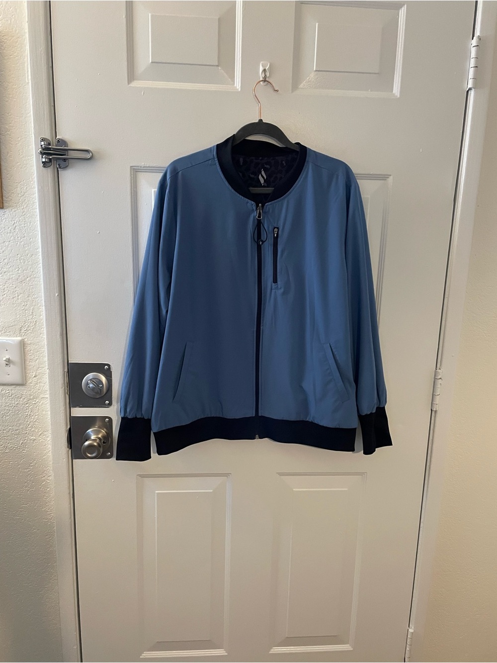Light Blue Bomber Jacket reversible Animal Print option with Black Trim